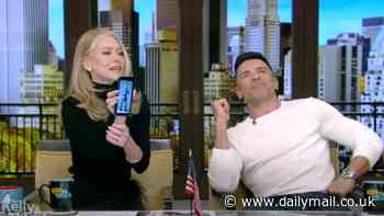 Kelly Ripa shows off 'unauthorized' nearly nude photo of husband Mark Consuelos on her phone