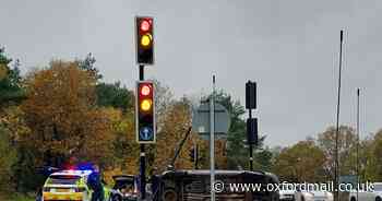 Dramatic picture shows car overturned at red light in traffic incident