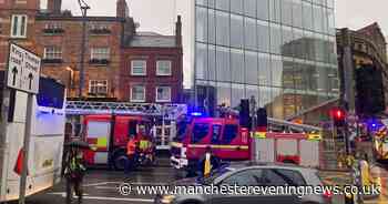 Fire crews tackle blaze in Manchester city centre building