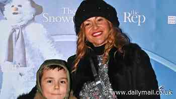 Jaime Winstone embraces winter fashion in a black suede coat and beanie as she joins son Raymond, eight, at The Snowman opening performance