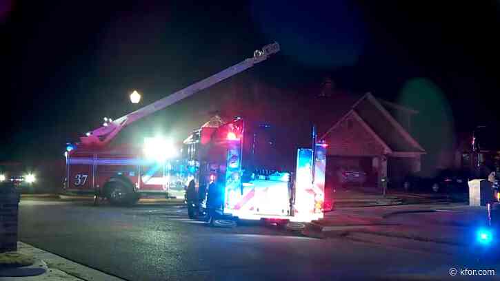 Firefighters battle house fire in NW OKC Saturday morning