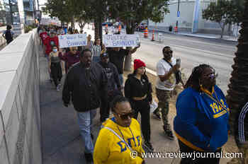 ‘The family is broken’: Crowd marches on Fremont Street in honor of Brandon Durham