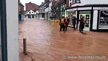 Shocking moment floodwaters gush down streets of market town as emergency service crews urge locals to 'get back': Death toll for Storm Bert rises to four 