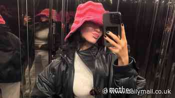 Kylie Jenner flashes her flat midriff in elevator selfie with her kids Stormi and Aire