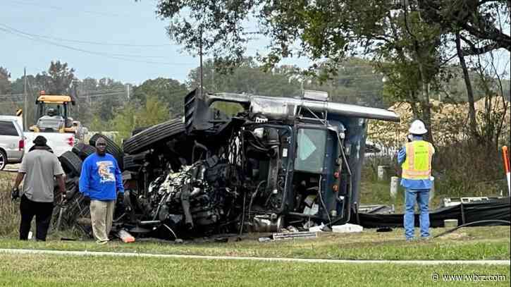 Two transported in serious condition after truck overturned, caught fire on Old Scenic Highway in Zachary