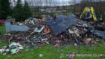 The house destroyed by Bert: Dramatic images show remains of Welsh home that had to be demolished after side was ripped off in strong winds