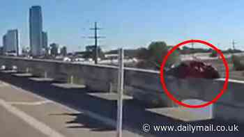 Hero cop reacts in the nick of time to save man sleeping on edge of Oklahoma bridge