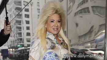 Long Island Medium Theresa Caputo steps out with biggest bouffant yet after getting mocked for size of hair