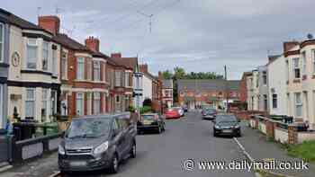 Baby boy is rushed to hospital with critical injuries after being found unresponsive at home - as man and woman are charged