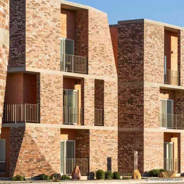 Jorge Urias unveils notched brick apartment complex in Mexico