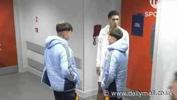 Jude Bellingham is spotted waiting to swap shirts with close pal Trent Alexander-Arnold outside the Liverpool dressing room after Real Madrid's Anfield defeat