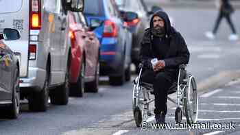 The professional gangs running Britain's Beggar Junctions: How 'aggressive' groups 'work in shifts' to hassle drivers out of hundreds every day