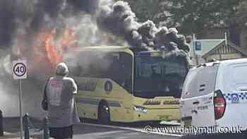 More than 30 children evacuated after the school bus they were in erupted into flames in NSW