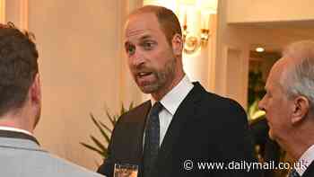 Prince William rocks a navy suit as he meets music legends at the Tusk Conservation Awards - and his beloved beard is longer than ever