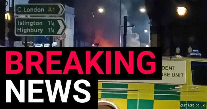 Firefighters rescue residents after huge blaze above restaurant in north London