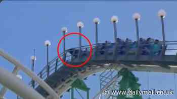 Jaw-dropping moment man climbs out of moving roller coaster after safety bar unlatches seconds before huge drop