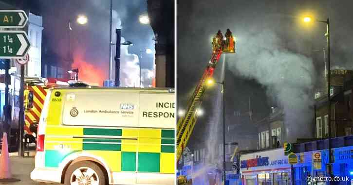 Homes evacuated after huge fire breaks out at a takeaway restaurant in north London