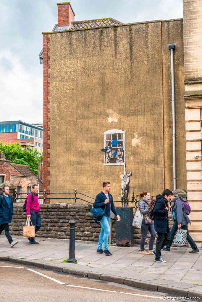 Banksy’s ‘Well Hung Lover’ Mural Will Soon Be Sold with the Building It is Painted on