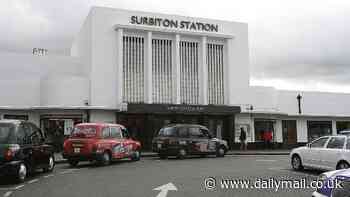 Schoolboys, 14 and 16, are arrested after suspected chemical attack at Surbiton railway station left two police officers needing urgent hospital treatment