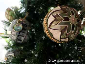 Oregon woman makes Christmas ornaments out of military uniforms, gifts them to families