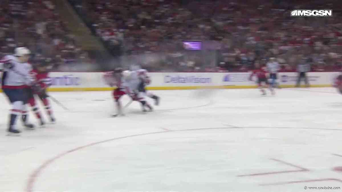 Taylor Raddysh scores a goal against the New Jersey Devils