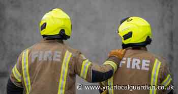 Mitcham garden shed fire which ran through nearby flats under investigation