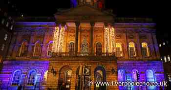 Liverpool's landmarks light up turquoise and yellow for symbolic reason