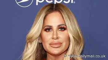 Kim Zolciak claims Kroy Biermann THREW her onto the ground in heated argument as their kids deny accusation