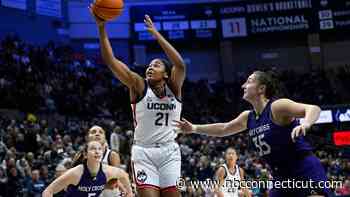 Freshman Sarah Strong scores 22 points to lead No. 2 UConn past Holy Cross 88-52