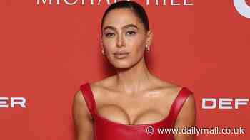 The shock society split on everyone's lips at the GQ Men of the Year Awards as bombshell actress rocks up solo in a red hot 'revenge dress'