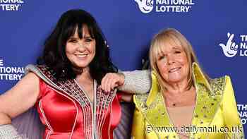 Loose Women stars Coleen Nolan and Linda Robson dress up in ABBA-inspired costumes as they attend the National Lottery New Year's Eve bash