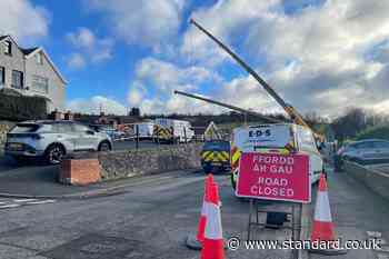 Residents forced from homes by sinkhole hope to return within week