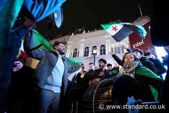 Syrians gather in London's Piccadilly Circus to celebrate fall of Assad regime