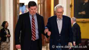 Mitch McConnell clings onto aide as he walks into Senate with injuries to his face and wrist after scary fall