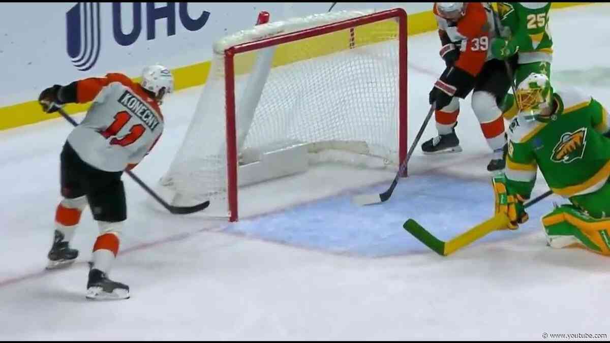 Michkov's stick blocks Konecny's shot...)