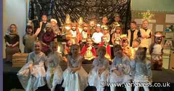 Children  celebrate Christmas season with festive production