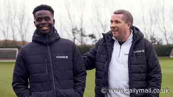 Bukayo Saka enjoys heartwarming reunion with his first ever grassroots football coach... as 'honoured' Arsenal and England star opens up on the impact he had on his career