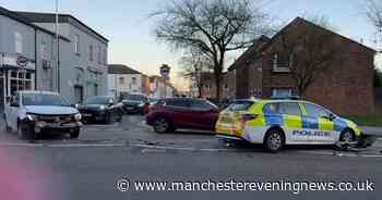 Bonnet ripped off in dramatic crash between police vehicle and car on busy main road