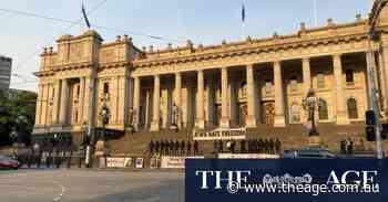 Police probe antisemitic sign on steps of Victorian parliament