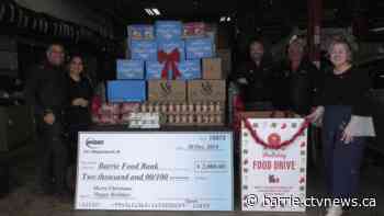 Barrie auto shop supports food bank with truckload of donations