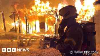 Fire crews tackle blaze involving caravans