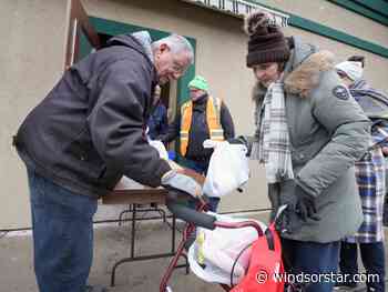 Windsor Goodfellows hand out 200 turkeys from Mikhail family