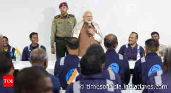 PM Modi meets Indian migrant workers at Gulf Spic Labour Camp in Kuwait