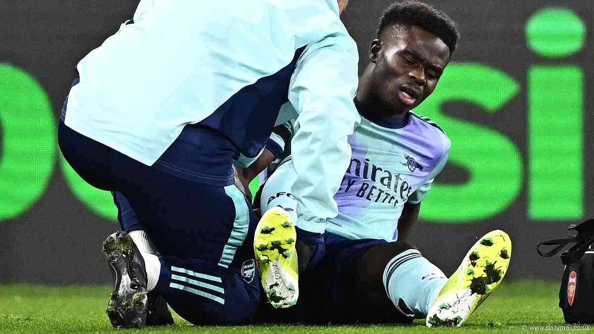 Bukayo Saka is forced off with injury during Arsenal's clash against Crystal Palace - as star is left clutching his hamstring at Selhurst Park