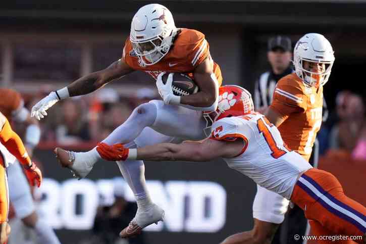 Texas holds off Clemson in College Football Playoff opener