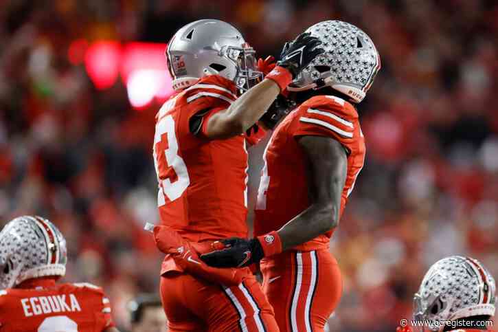 Howard throws 2 TD passes to Smith to help Ohio State rout Tennessee in College Football Playoff