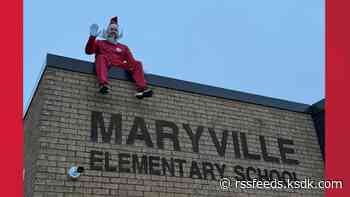 Metro East principal's rooftop surprise delights students ahead of Christmas break