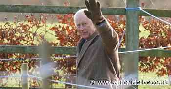 King Charles pictured waving to crowds as he leaves Sandringham church service