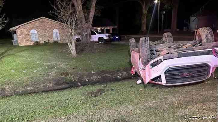 Firefighters rescue person from flipped car