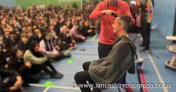 Cheers and tears as teacher shaves head in front of entire school to support grandson